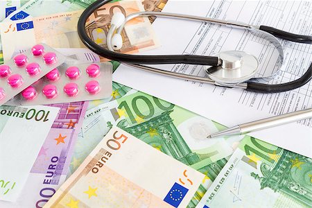 simsearch:400-04758612,k - Costs for medical insurance. Euro, stethoscope, pills and medical form. Stock Photo - Budget Royalty-Free & Subscription, Code: 400-06947036