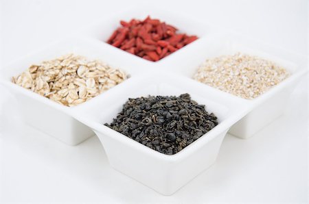 simsearch:400-07545974,k - Diet and Nutrition - Green tea, oat bran, goji and oat flakes - Nutrient value and antioxidant content Stock Photo - Budget Royalty-Free & Subscription, Code: 400-06947033
