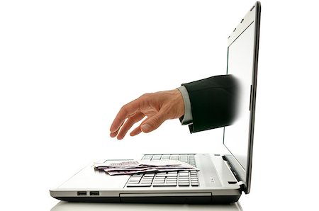 scam - Hand reaching out of laptop screen to steal ones money. Stock Photo - Budget Royalty-Free & Subscription, Code: 400-06947281