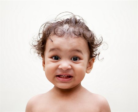 simsearch:400-07506232,k - Angry indian baby boy over white background Stock Photo - Budget Royalty-Free & Subscription, Code: 400-06947586