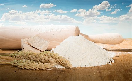 Rolling pin,flour and wheat ears. Cereal crops on the background Stock Photo - Budget Royalty-Free & Subscription, Code: 400-06947651