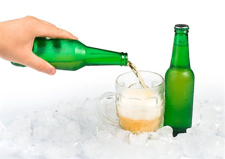 simsearch:400-05062911,k - Green bottle of beer and beer mug. White isolated studio shot. Foto de stock - Super Valor sin royalties y Suscripción, Código: 400-06947668