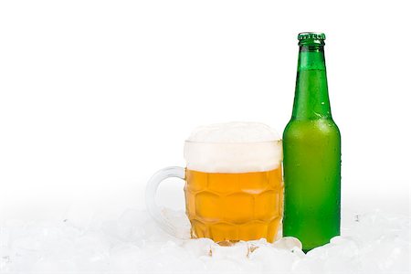 simsearch:400-05062911,k - Green bottle of beer and beer mug. White isolated studio shot. Foto de stock - Super Valor sin royalties y Suscripción, Código: 400-06947669