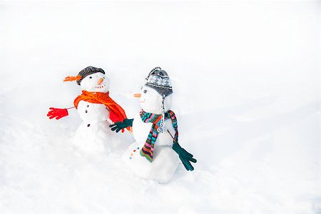 simsearch:400-05681859,k - snowmen in love taking hand each other Stock Photo - Budget Royalty-Free & Subscription, Code: 400-06947950