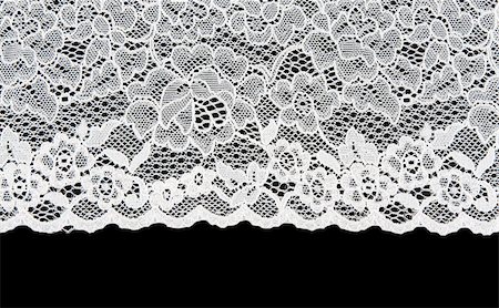 simsearch:400-05677711,k - White patterned lace isolated on black background Foto de stock - Royalty-Free Super Valor e Assinatura, Número: 400-06947961