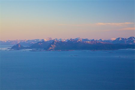 simsearch:400-07087598,k - Scenic mountain range on Lofoten islands in Norway lit by midnight sun in early summer Stock Photo - Budget Royalty-Free & Subscription, Code: 400-06948150