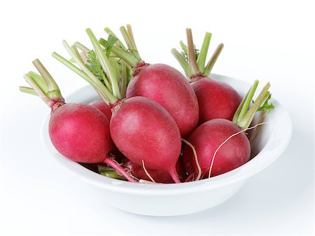 simsearch:400-07422782,k - heap of ripe radishes in plate, isolated on white background Photographie de stock - Aubaine LD & Abonnement, Code: 400-06948413