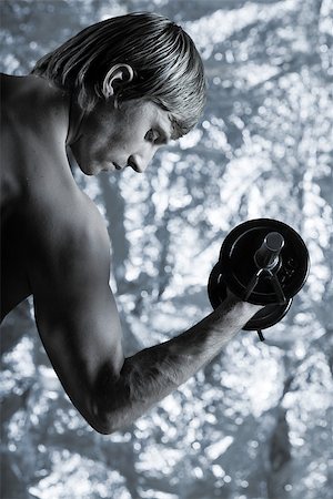 simsearch:400-06202305,k - studio portrait of handsome blond man torso naked doing workout Foto de stock - Super Valor sin royalties y Suscripción, Código: 400-06949020