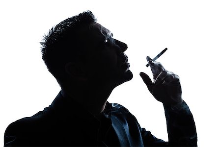 one caucasian man portrait smoking cigarette silhouette in studio isolated white background Stock Photo - Budget Royalty-Free & Subscription, Code: 400-06949054