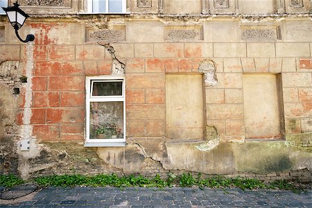 simsearch:400-05947515,k - Aged weathered street wall with some windows Photographie de stock - Aubaine LD & Abonnement, Code: 400-06949423