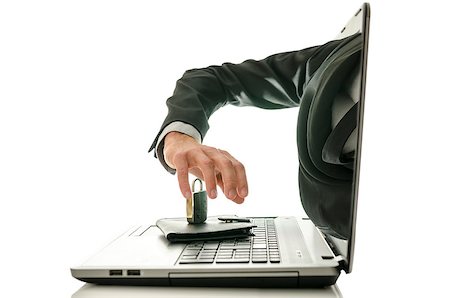 Male hand coming out of laptop monitor stealing ones wallet. Isolated over white background. Stock Photo - Budget Royalty-Free & Subscription, Code: 400-06949830