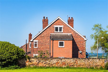 english house facade - Typical English house on blue sky Stock Photo - Budget Royalty-Free & Subscription, Code: 400-06949952