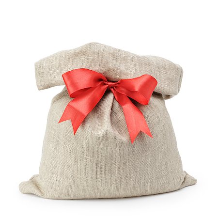 simsearch:700-03405572,k - sack gift bag with ribbon bow, isolated on white Photographie de stock - Aubaine LD & Abonnement, Code: 400-06954200