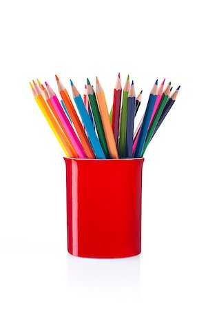 colorful pencils in a red pen holder on white background Stock Photo - Budget Royalty-Free & Subscription, Code: 400-06954297