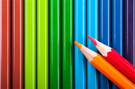 Red and orange pencils on Row of Colored pencils Stock Photo - Budget Royalty-Free & Subscription, Code: 400-06954304