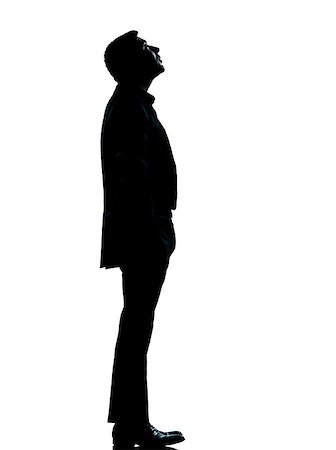 simsearch:400-06794896,k - one caucasian business man silhouette standing looking up Full length in studio isolated on white background Stock Photo - Budget Royalty-Free & Subscription, Code: 400-06954329