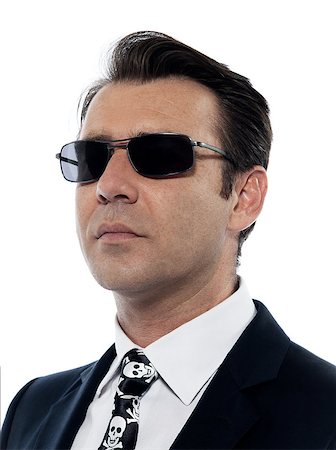 simsearch:400-04674632,k - one Man caucasian criminal portrait serious wih sunglasses in studio isolated on white background Foto de stock - Super Valor sin royalties y Suscripción, Código: 400-06954354