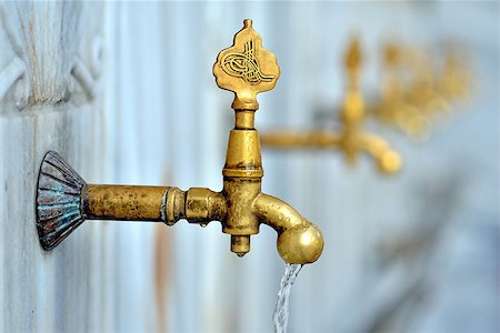 Antique Turkish faucet on wall Stock Photo - Budget Royalty-Free & Subscription, Code: 400-06954615