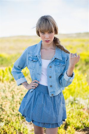 simsearch:400-06956665,k - Mysterious trendy young woman posing in a sunny arid land Stockbilder - Microstock & Abonnement, Bildnummer: 400-06955631