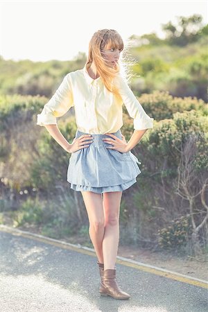 simsearch:400-06956665,k - Shocked gorgeous blonde on the roadside on a glowing background Stockbilder - Microstock & Abonnement, Bildnummer: 400-06955905