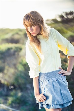 simsearch:400-06956665,k - Mysterious gorgeous blonde on the roadside posing on a glowing background Stockbilder - Microstock & Abonnement, Bildnummer: 400-06955908