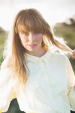 simsearch:400-06956665,k - Mysterious attractive blonde posing on the roadside in summertime Stockbilder - Microstock & Abonnement, Bildnummer: 400-06955915