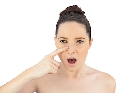 shoulder rides - Shocked natural model showing wrinkle on her nose while posing on white background Photographie de stock - Aubaine LD & Abonnement, Code: 400-06955957