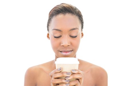 simsearch:400-06960125,k - Natural beauty with closed eyes and coffee cup on white background Photographie de stock - Aubaine LD & Abonnement, Code: 400-06958905