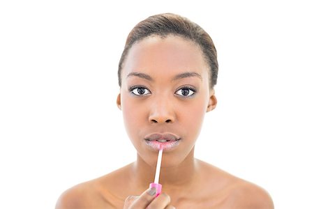 simsearch:400-06960125,k - Natural beauty using lip gloss on white background Photographie de stock - Aubaine LD & Abonnement, Code: 400-06958900