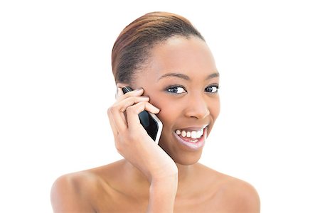 simsearch:400-06960125,k - Cheerful phoning natural beauty on white background Photographie de stock - Aubaine LD & Abonnement, Code: 400-06958916
