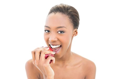 simsearch:400-06960125,k - Smiling natural beauty biting apple on white background Photographie de stock - Aubaine LD & Abonnement, Code: 400-06958923