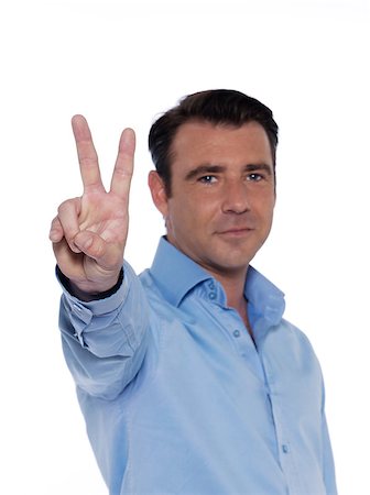 man portrait victory sign studio isolated on white background Stock Photo - Budget Royalty-Free & Subscription, Code: 400-06950974