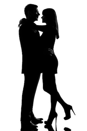 simsearch:400-07097695,k - one caucasian lovers couple man and woman hugging tenderness in studio silhouette isolated on white background Stock Photo - Budget Royalty-Free & Subscription, Code: 400-06951010