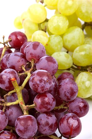 A bunch of green and red grapes isolated on a white background Foto de stock - Super Valor sin royalties y Suscripción, Código: 400-06951384