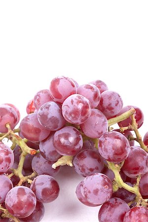 Cluster of red grapes isolated on a white background Foto de stock - Super Valor sin royalties y Suscripción, Código: 400-06951381