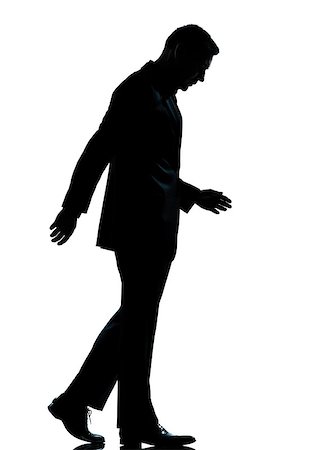 simsearch:400-06794896,k - one caucasian business man walking silhouette Full length in studio isolated on white background Stock Photo - Budget Royalty-Free & Subscription, Code: 400-06951906
