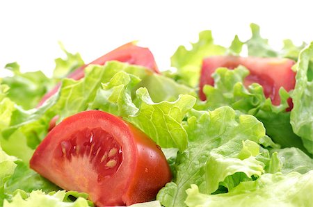 simsearch:400-06954534,k - Closeup of a fresh tomato and lettuce salad. Shallow dof. Stock Photo - Budget Royalty-Free & Subscription, Code: 400-06951950