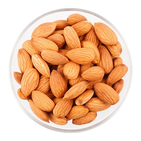 simsearch:400-05309215,k - Bowl with dried almonds isolated on a white background Fotografie stock - Microstock e Abbonamento, Codice: 400-06952194