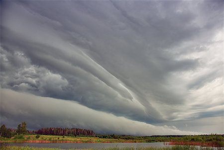 simsearch:400-04385665,k - storm Clouds over field. Siberia.Russia Foto de stock - Super Valor sin royalties y Suscripción, Código: 400-06952198