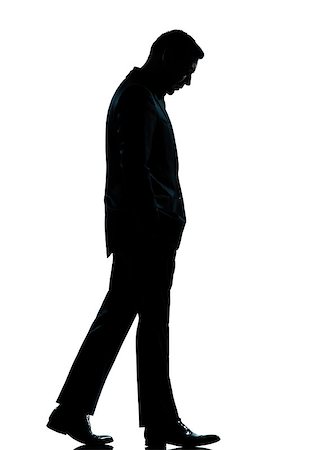 simsearch:400-06794896,k - one caucasian business man walking silhouette Full length in studio isolated on white background Stock Photo - Budget Royalty-Free & Subscription, Code: 400-06952589
