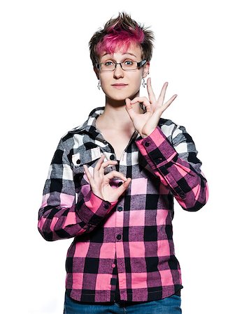 Portrait of a young serene Woman making hand gesture ok sign  in studio on white isolated background Stock Photo - Budget Royalty-Free & Subscription, Code: 400-06952668