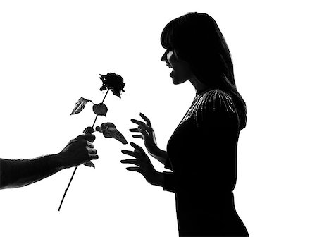 man hand offering a flower rose stylish sexy silhouette caucasian beautiful woman on studio isolated white background Photographie de stock - Aubaine LD & Abonnement, Code: 400-06952719