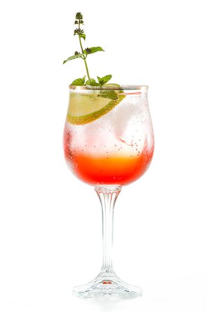 simsearch:824-07586341,k - sparkling water served in a gold rimmed wine glass with a splash of cherry juice and a lime and mint garnish Stockbilder - Microstock & Abonnement, Bildnummer: 400-06952847