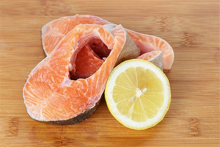 simsearch:400-08187570,k - two fresh trout steaks on cutting board Stockbilder - Microstock & Abonnement, Bildnummer: 400-06953038