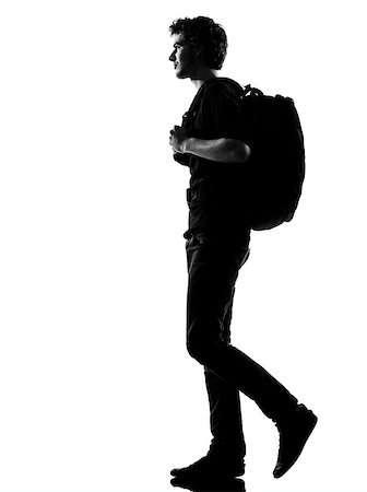 young man backpacker walking silhouette in studio isolated on white background Photographie de stock - Aubaine LD & Abonnement, Code: 400-06953133