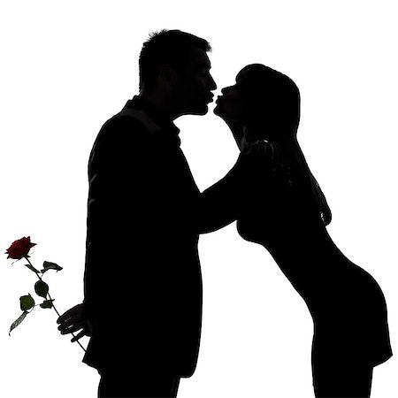 simsearch:400-07097695,k - one caucasian couple man and woman kissing in studio silhouette isolated on white background Stock Photo - Budget Royalty-Free & Subscription, Code: 400-06953281