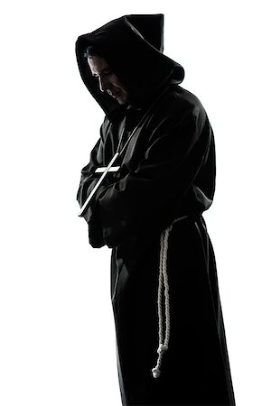 simsearch:614-02764159,k - one caucasian man priest praying silhouette in studio isolated on white background Stockbilder - Microstock & Abonnement, Bildnummer: 400-06953351