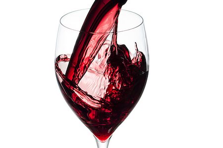 simsearch:400-04232915,k - Glass of red wine splashing while being poured.Isolated on white. Stock Photo - Budget Royalty-Free & Subscription, Code: 400-06953483