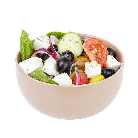 fresh greek salad in clay bowl, isolated on white Stock Photo - Budget Royalty-Free & Subscription, Code: 400-06953597