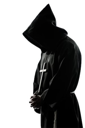simsearch:614-02764159,k - one caucasian man priest praying silhouette in studio isolated on white background Stockbilder - Microstock & Abonnement, Bildnummer: 400-06953792